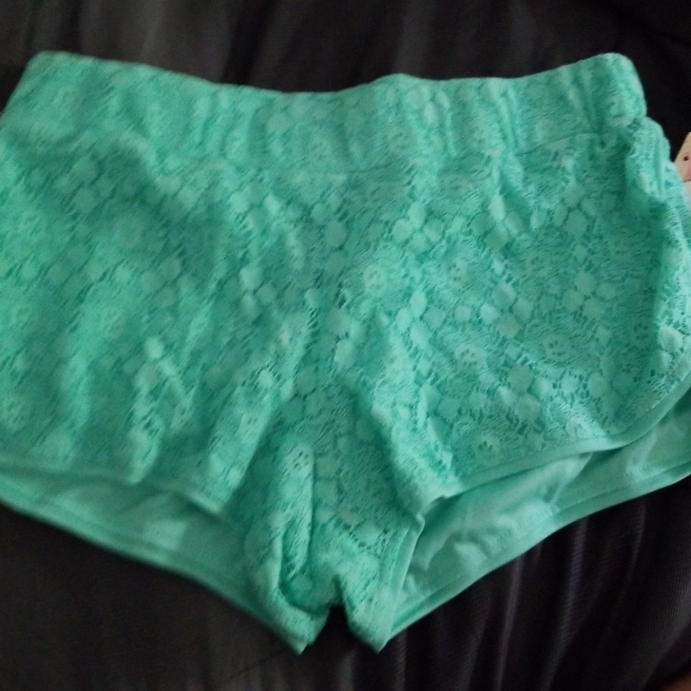 Teal shorts with lace detail